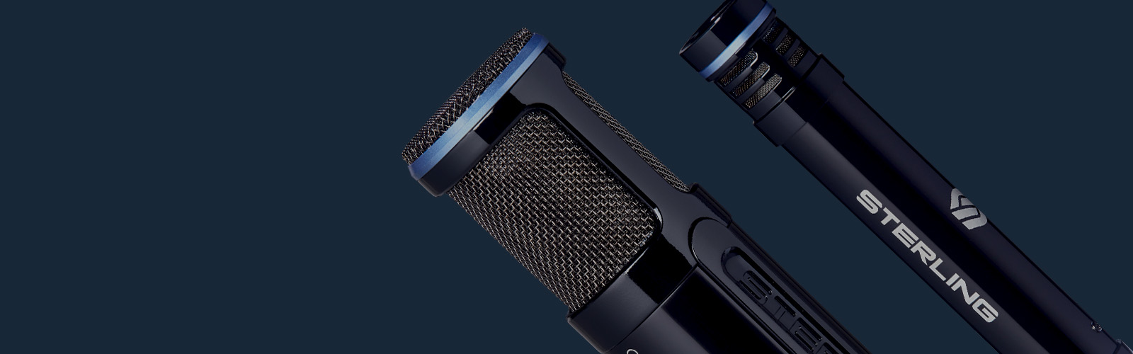 Sterling SP150/130 studio condenser microphone pack on blue background close up.