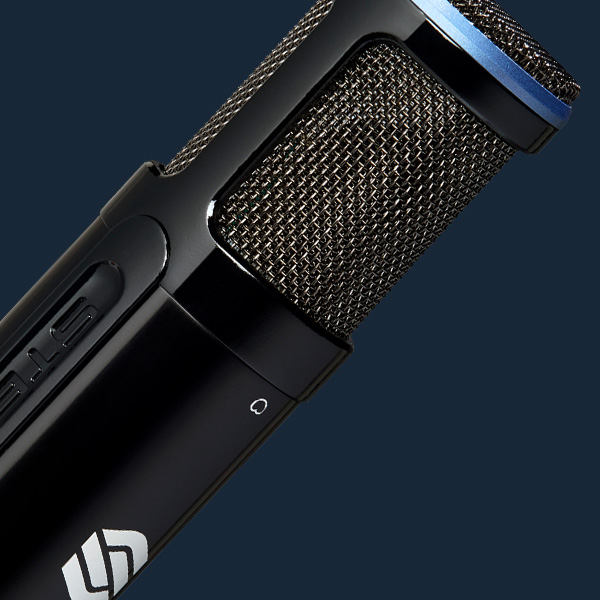 Sterling SP150SMK studio condenser microphones pack left close up on blue background