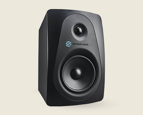 Sterling MX5 5-inch powered studio monitor right on light background.