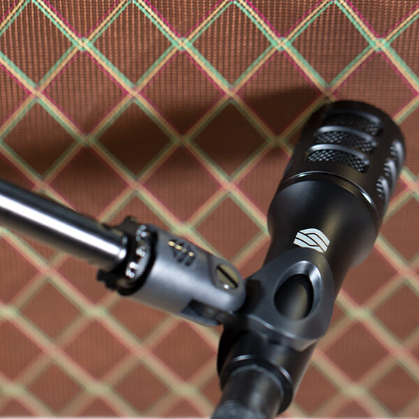 Sterling P10 instrument microphone with amplifier close up.