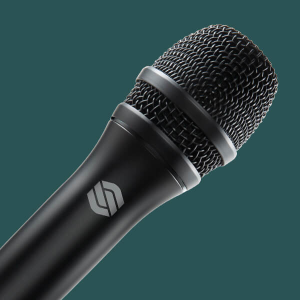 Sterling P20 live vocal microphone angled on a green background.