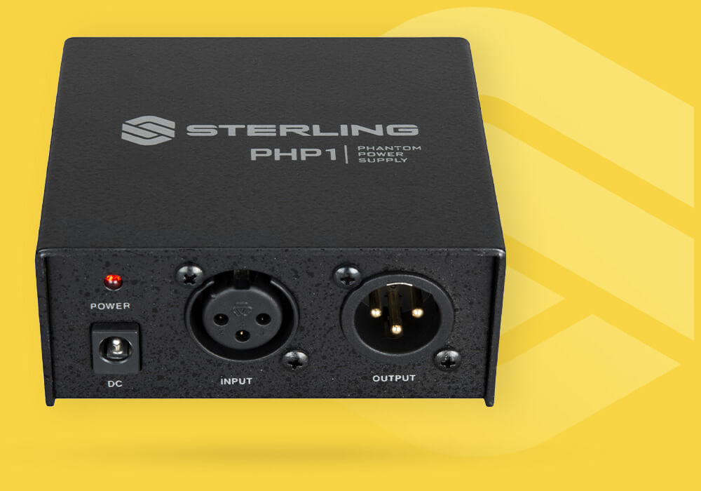 Sterling PHP1 external phantom power supply right angle on yellow background with Sterling logo.