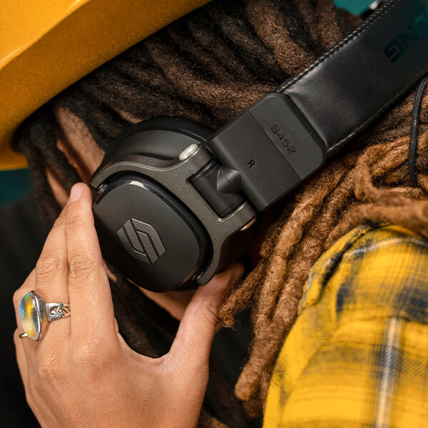 Sterling S452 studio headphones on woman up close.