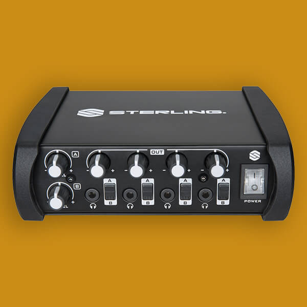Sterling SHA4 4-channel desktop headphone amplifier front on yellow background.